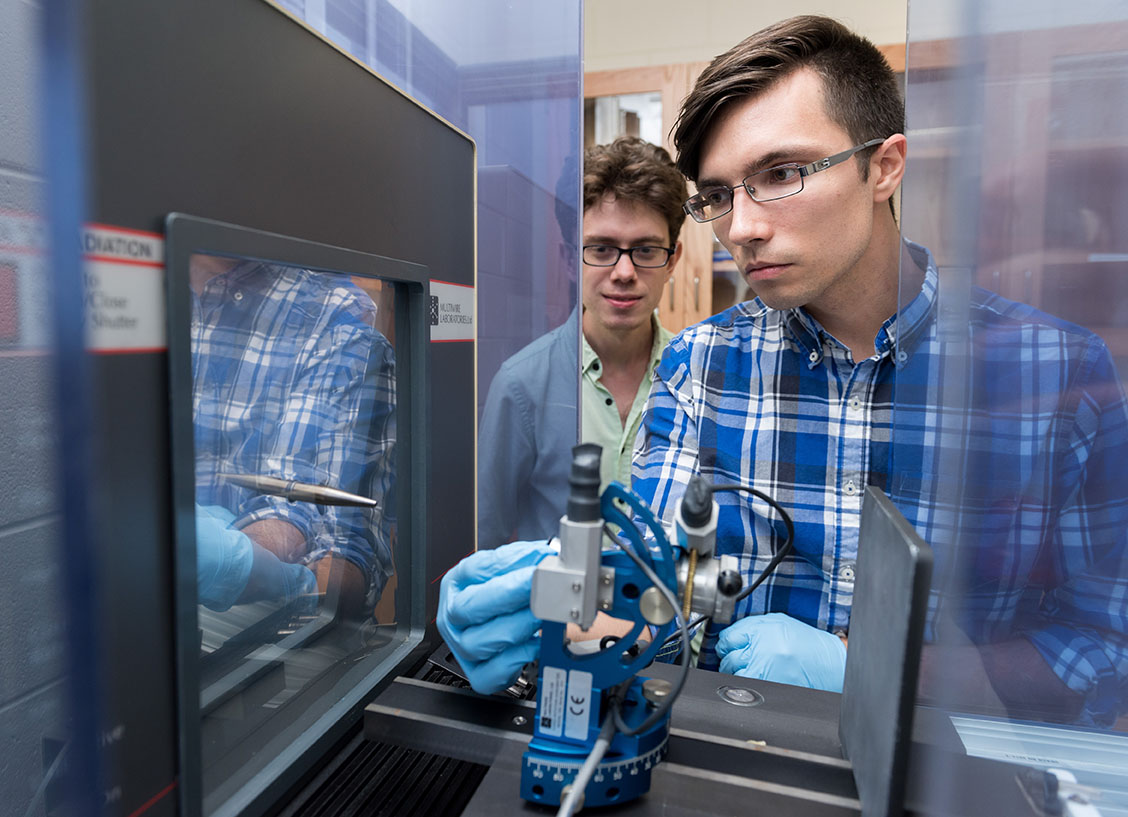 Students working on an Xray in a lab