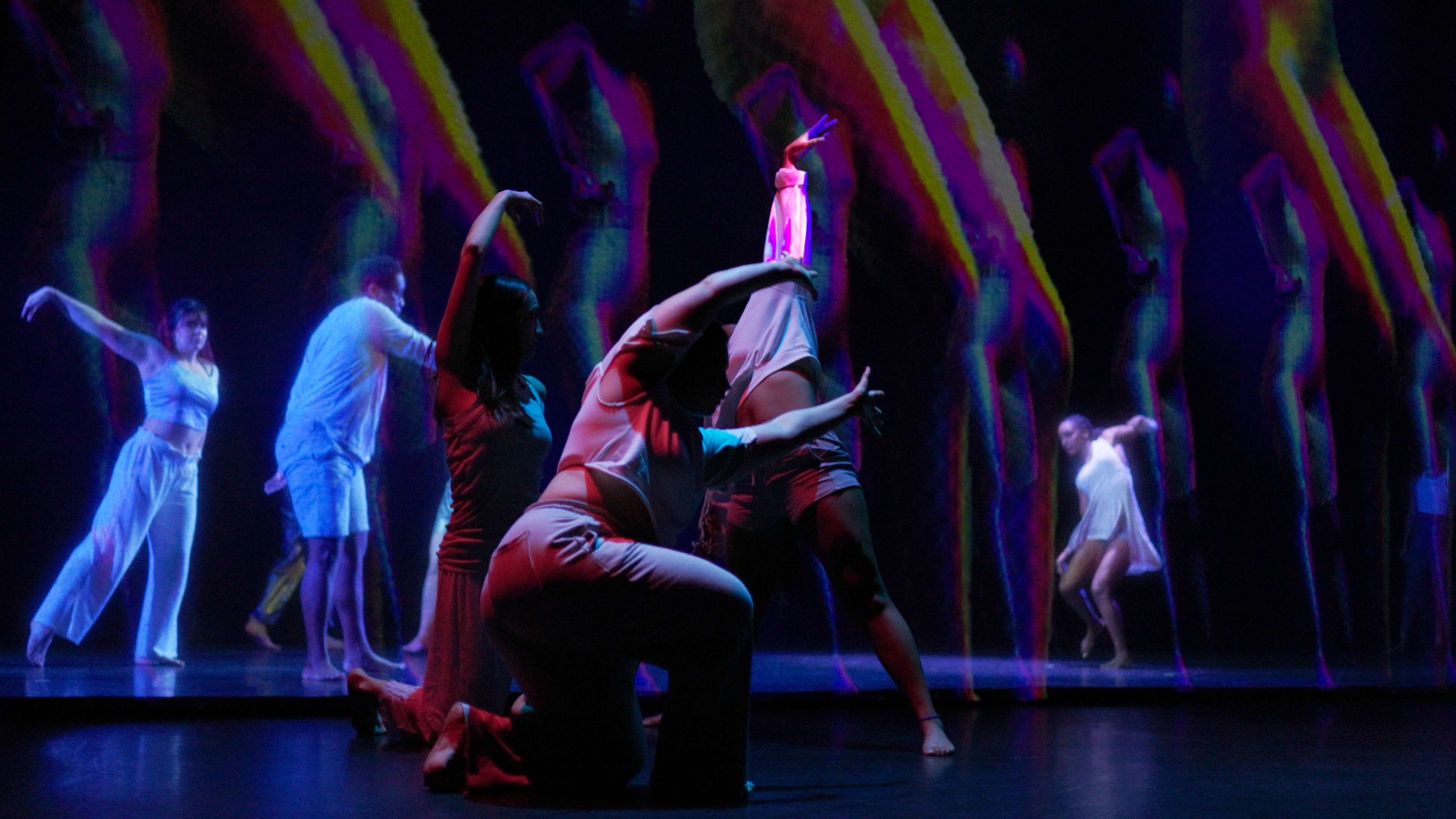 Performers on stage during a Lumina AI performance.