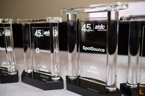 ATDC Class of 2025 Awards with SpotSource and Speedscale awards in view.