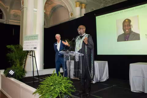Sam Eniojukan, chief technology officer and co-founder of VoiceWorx.ai giving a speech during ATDC graduation.