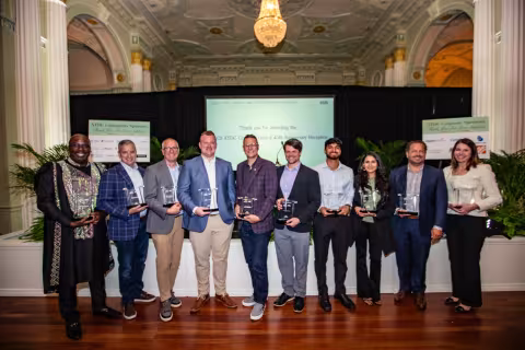10 founders or team members of the 17 ATDC graduating companies standing with their graduation awards.