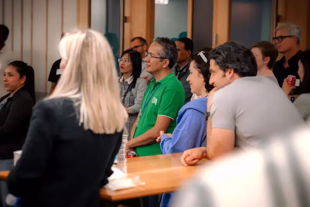 Group of people listening to a presentation during ATDC's entrepreneur night.